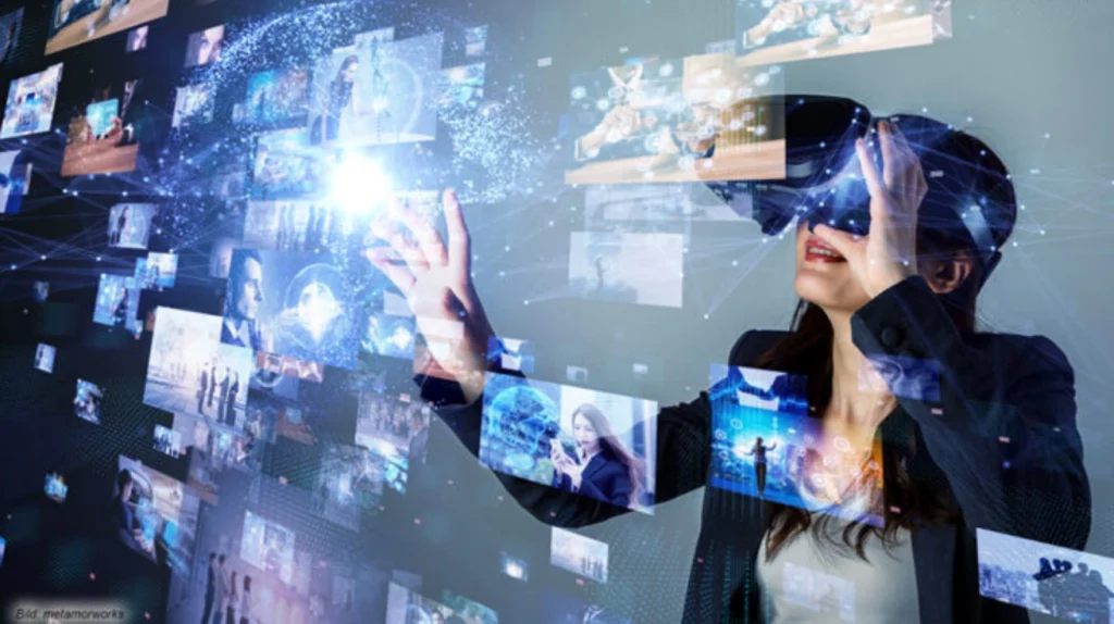 A futuristic conceptual image showing a woman wearing a virtual reality headset while interacting with multiple floating digital content panels. The image represents next-generation entertainment technology with numerous video thumbnails and media content displayed as if in a virtual space around her. She appears to be reaching out to touch or manipulate the content while wearing the VR device. This illustrates a potential future evolution of IPTV technology integrated with virtual reality.